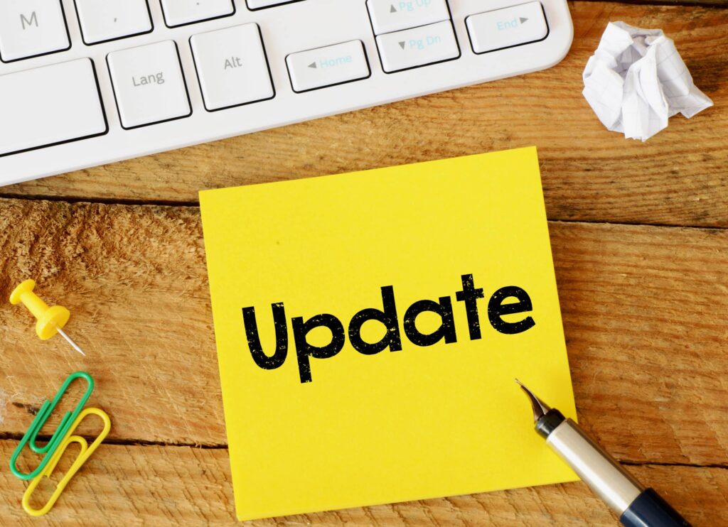 Update/update,Sticker,With,Marketing,Plan,Inscription,Over,Computer,Keyboard